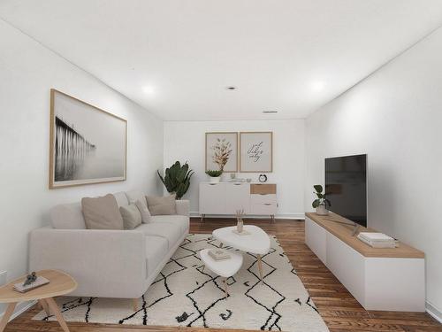 Salle familiale - 5735 Rue Parizeau, Brossard, QC - Indoor Photo Showing Living Room