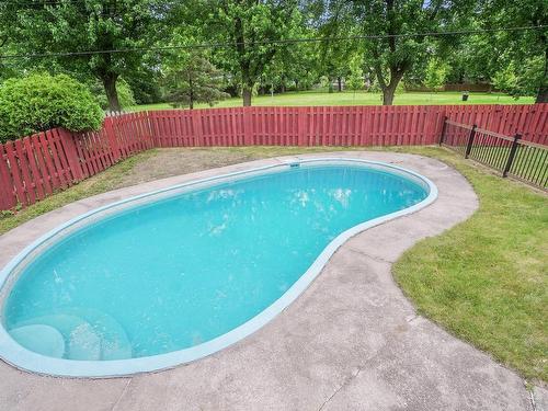 Cour - 5735 Rue Parizeau, Brossard, QC - Outdoor With In Ground Pool With Backyard