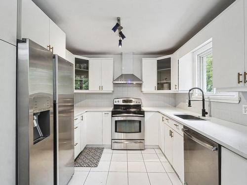 Cuisine - 5735 Rue Parizeau, Brossard, QC - Indoor Photo Showing Kitchen With Upgraded Kitchen