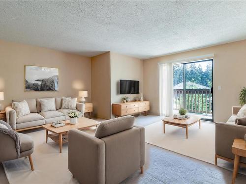 202-4724 Uplands Dr, Nanaimo, BC - Indoor Photo Showing Living Room