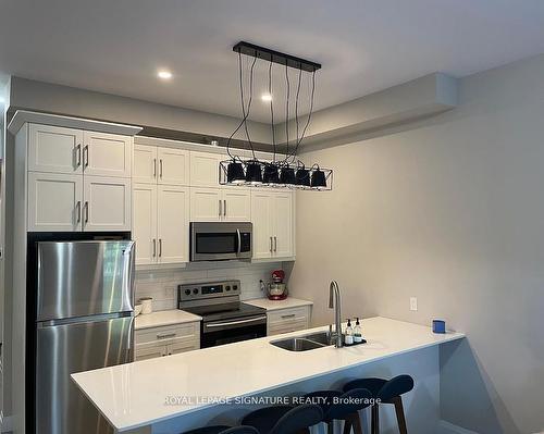 123-25 Concession St, Cambridge, ON - Indoor Photo Showing Kitchen With Stainless Steel Kitchen With Double Sink