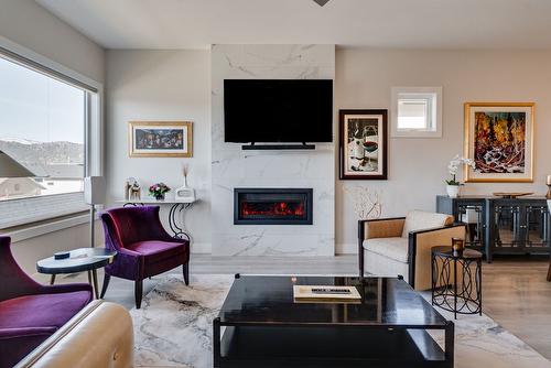 2-777 Denali Drive, Kelowna, BC - Indoor Photo Showing Living Room With Fireplace