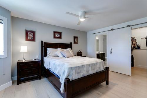 309-1385 Bertram Street, Kelowna, BC - Indoor Photo Showing Bedroom