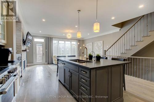 3139 Riverpath Common, Oakville, ON - Indoor Photo Showing Kitchen With Double Sink With Upgraded Kitchen