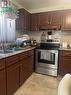 8352 Gregory Place, Windsor, ON  - Indoor Photo Showing Kitchen With Double Sink 