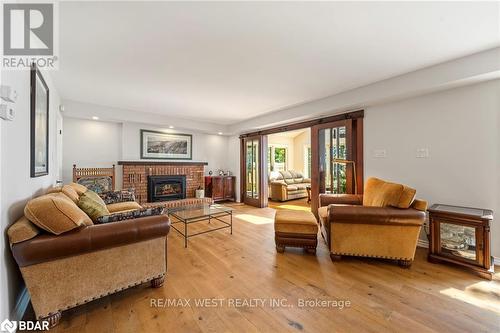 38 Willow Drive, Tiny, ON - Indoor Photo Showing Living Room With Fireplace