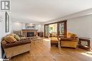 38 Willow Drive, Tiny, ON  - Indoor Photo Showing Living Room With Fireplace 