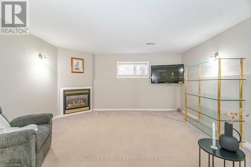 63 Hillgarden Drive, Hamilton, ON - Indoor Photo Showing Living Room With Fireplace