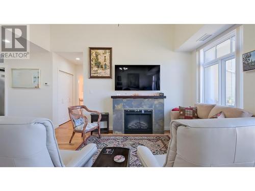 3301 Skaha Lake Road Unit# 801, Penticton, BC - Indoor Photo Showing Living Room With Fireplace