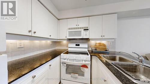 413 - 19 Barberry Place, Toronto (Bayview Village), ON - Indoor Photo Showing Kitchen With Double Sink