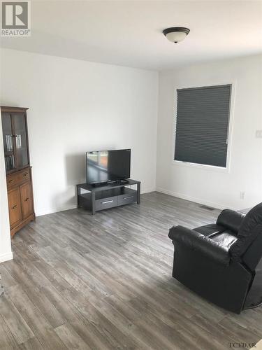 22 St. Joseph, Belle Vallee, ON - Indoor Photo Showing Living Room