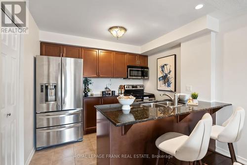 217 - 61 Clarington Boulevard, Clarington (Bowmanville), ON - Indoor Photo Showing Kitchen With Double Sink