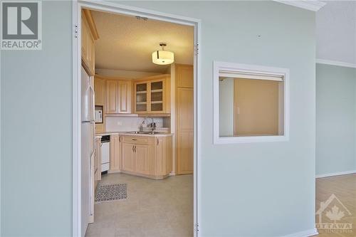 View into kitchen from dining room - 1285 Cahill Avenue Unit#1303, Ottawa, ON -  Photo Showing Other Room