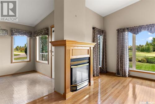 76 St Andrews Bay, Emerald Park, SK - Indoor With Fireplace