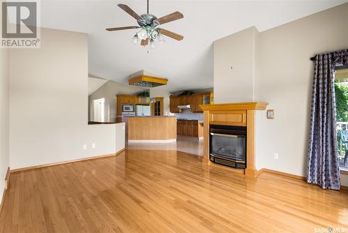 76 St Andrews Bay, Emerald Park, SK - Indoor With Fireplace