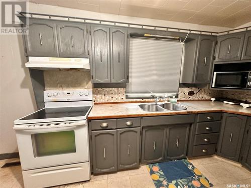 229 2Nd Avenue Nw, Preeceville, SK - Indoor Photo Showing Kitchen With Double Sink