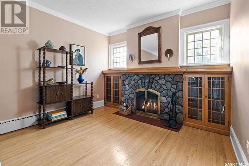 1038 University Drive, Saskatoon, SK - Indoor Photo Showing Living Room With Fireplace