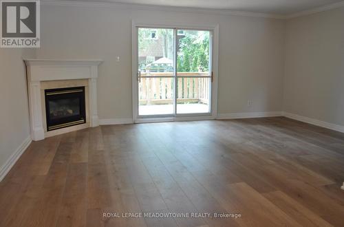 5 - 2056 Marine Drive, Oakville (Bronte West), ON - Indoor Photo Showing Living Room With Fireplace