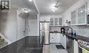 203 - 1050 Stainton Drive E, Mississauga, ON  - Indoor Photo Showing Kitchen With Upgraded Kitchen 