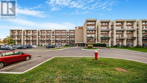 203 - 1050 Stainton Drive E, Mississauga (Erindale), ON - Outdoor With Balcony With Facade