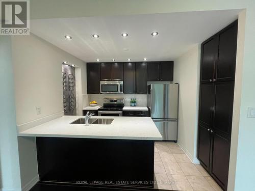 204 - 70 Port Street E, Mississauga (Port Credit), ON - Indoor Photo Showing Kitchen With Double Sink With Upgraded Kitchen