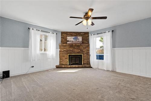 7693 Ronnie Crescent, Niagara Falls, ON - Indoor Photo Showing Living Room With Fireplace