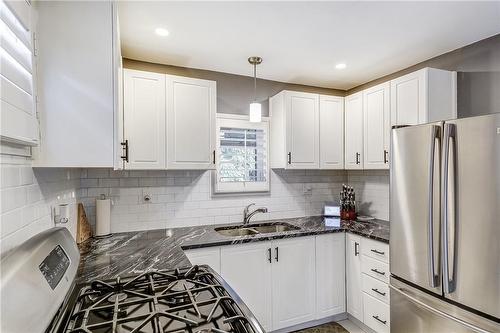 327 East 12Th Street, Hamilton, ON - Indoor Photo Showing Kitchen With Double Sink