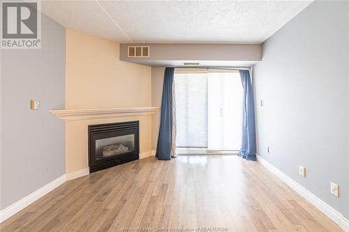 1323 Langlois Avenue Unit# 105, Windsor, ON - Indoor Photo Showing Living Room With Fireplace