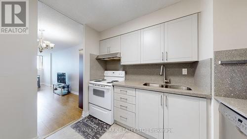 510 - 10 Tapscott Road, Toronto, ON - Indoor Photo Showing Kitchen With Double Sink