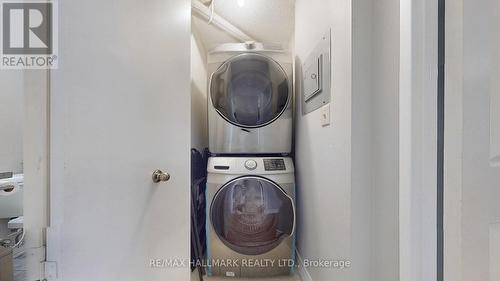 510 - 10 Tapscott Road, Toronto, ON - Indoor Photo Showing Laundry Room