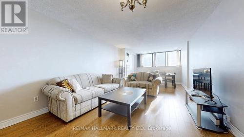 510 - 10 Tapscott Road, Toronto, ON - Indoor Photo Showing Living Room