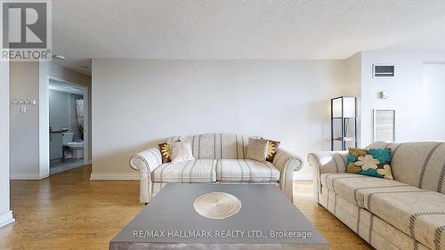 510 - 10 Tapscott Road, Toronto, ON - Indoor Photo Showing Living Room