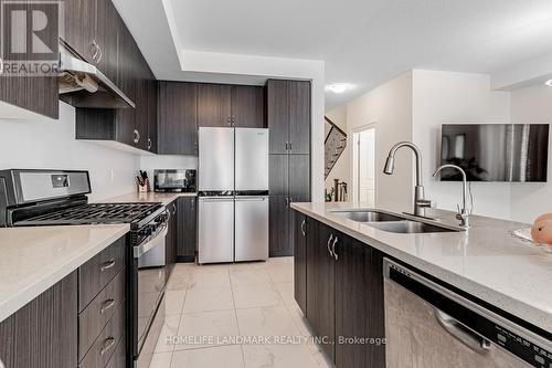 31 Liam Lane, Markham (Cedarwood), ON - Indoor Photo Showing Kitchen With Double Sink With Upgraded Kitchen