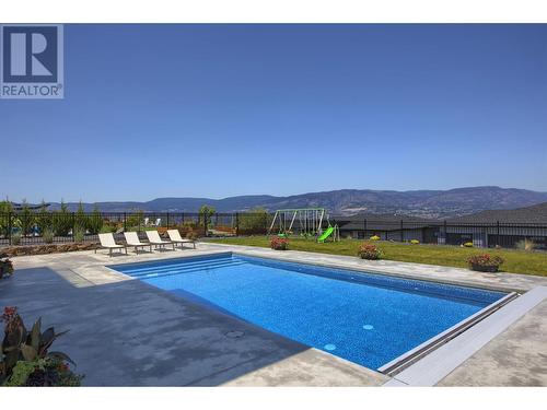 446 Hawk Hill Drive, Kelowna, BC - Outdoor With In Ground Pool With Backyard With View