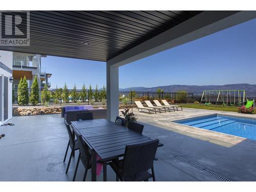 446 Hawk Hill Drive, Kelowna, BC - Outdoor With In Ground Pool With Deck Patio Veranda With View With Exterior