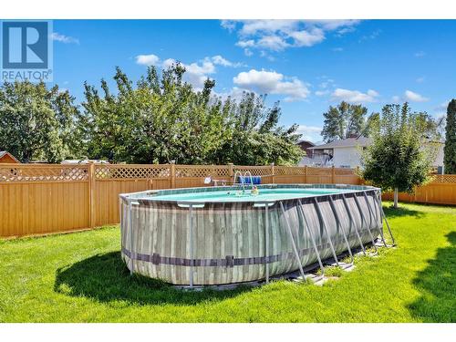 1055 Thompson Road, Kelowna, BC - Outdoor With Above Ground Pool With Backyard