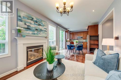 648 Hood Terrace, Milton, ON - Indoor Photo Showing Living Room With Fireplace