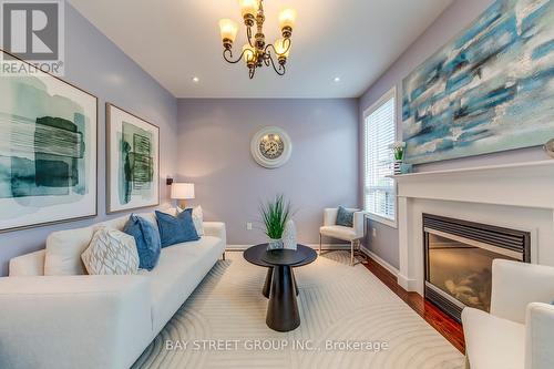 648 Hood Terrace, Milton, ON - Indoor Photo Showing Living Room With Fireplace