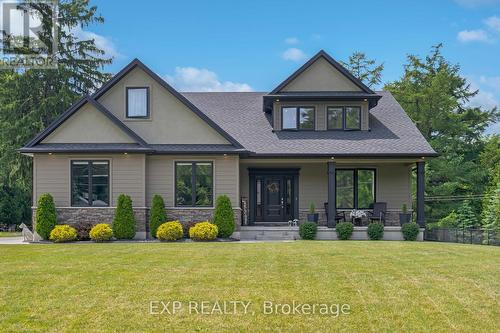 8037 Springwater Road, Aylmer, ON - Outdoor With Deck Patio Veranda With Facade