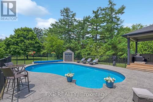 8037 Springwater Road, Aylmer (Ay), ON - Outdoor With In Ground Pool With Backyard