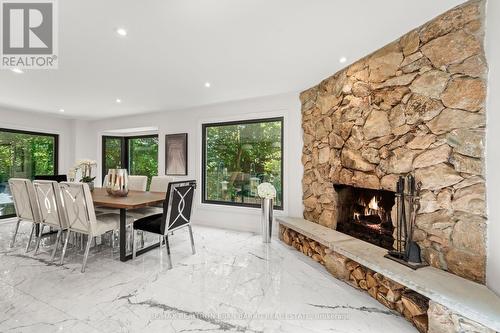 13 Bluffwood Drive, Toronto (Bayview Woods-Steeles), ON - Indoor Photo Showing Dining Room With Fireplace