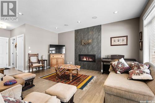 315 Mahabir Court, Saskatoon, SK - Indoor Photo Showing Living Room With Fireplace