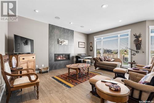 315 Mahabir Court, Saskatoon, SK - Indoor Photo Showing Living Room With Fireplace