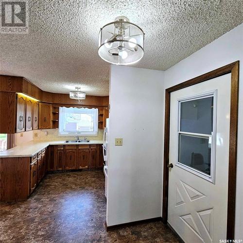 219 Carl Avenue E, Langenburg, SK - Indoor Photo Showing Kitchen With Double Sink