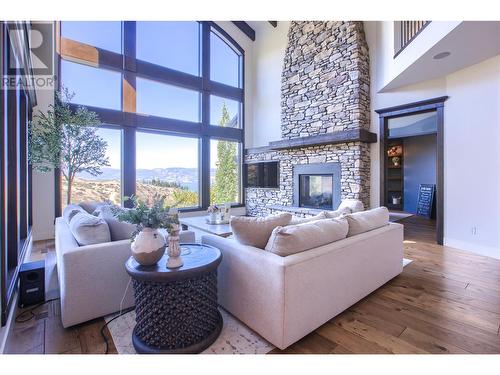 373 Farron Court, Kelowna, BC - Indoor Photo Showing Living Room With Fireplace