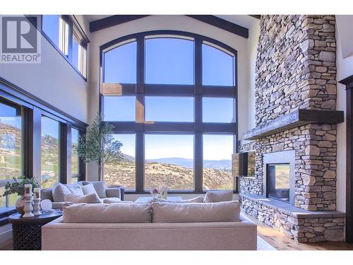 373 Farron Court, Kelowna, BC - Indoor Photo Showing Living Room With Fireplace