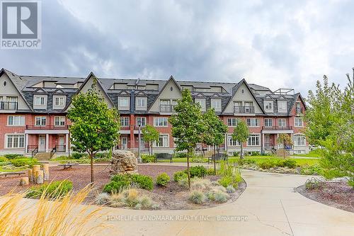 18 - 8 Eaton Park Lane, Toronto (L'Amoreaux), ON - Outdoor With Facade