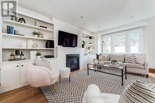 20 Courcelette Road, Toronto (Birchcliffe-Cliffside), ON - Indoor Photo Showing Living Room With Fireplace