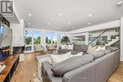 32 Lyme Regis Crescent, Toronto (Cliffcrest), ON - Indoor Photo Showing Living Room With Fireplace