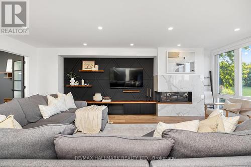 32 Lyme Regis Crescent, Toronto (Cliffcrest), ON - Indoor Photo Showing Living Room With Fireplace